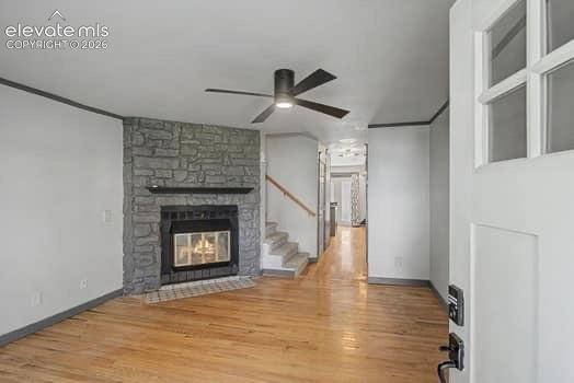 Image 2 of 20: Just inside the unit you are welcomed by a spacious living room with hardwo