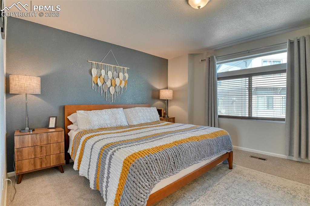 Image 14 of 30: Master Bedroom