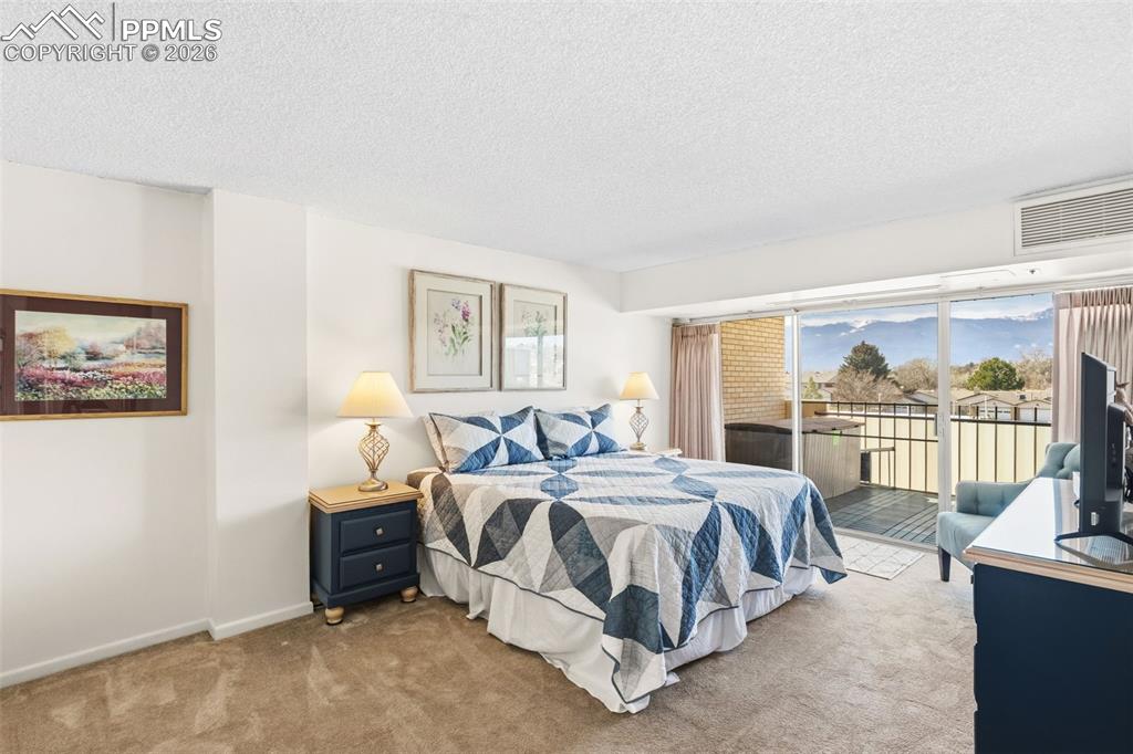 Image 32 of 38: Master Bedroom