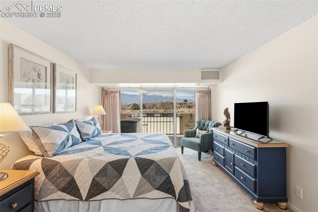 Image 34 of 38: Master Bedroom