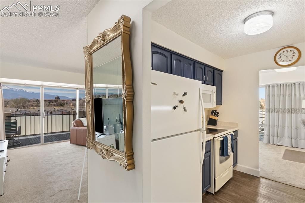 Image 8 of 38: Entry to Kitchen