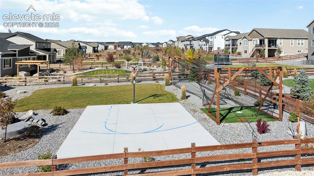 Image 13 of 39: Private Batting Cage
and Basketball Court
included.