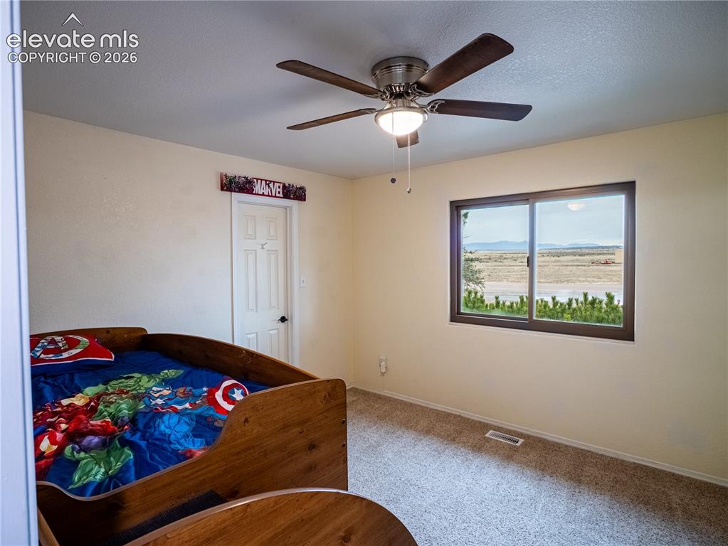 Image 12 of 30: Bedroom