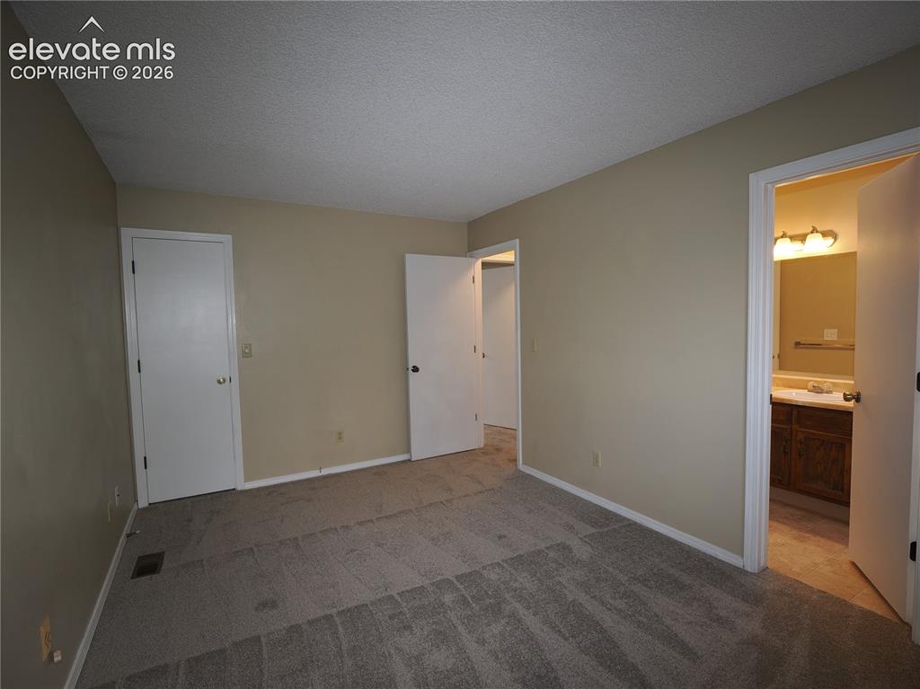 Image 14 of 28: Bedroom