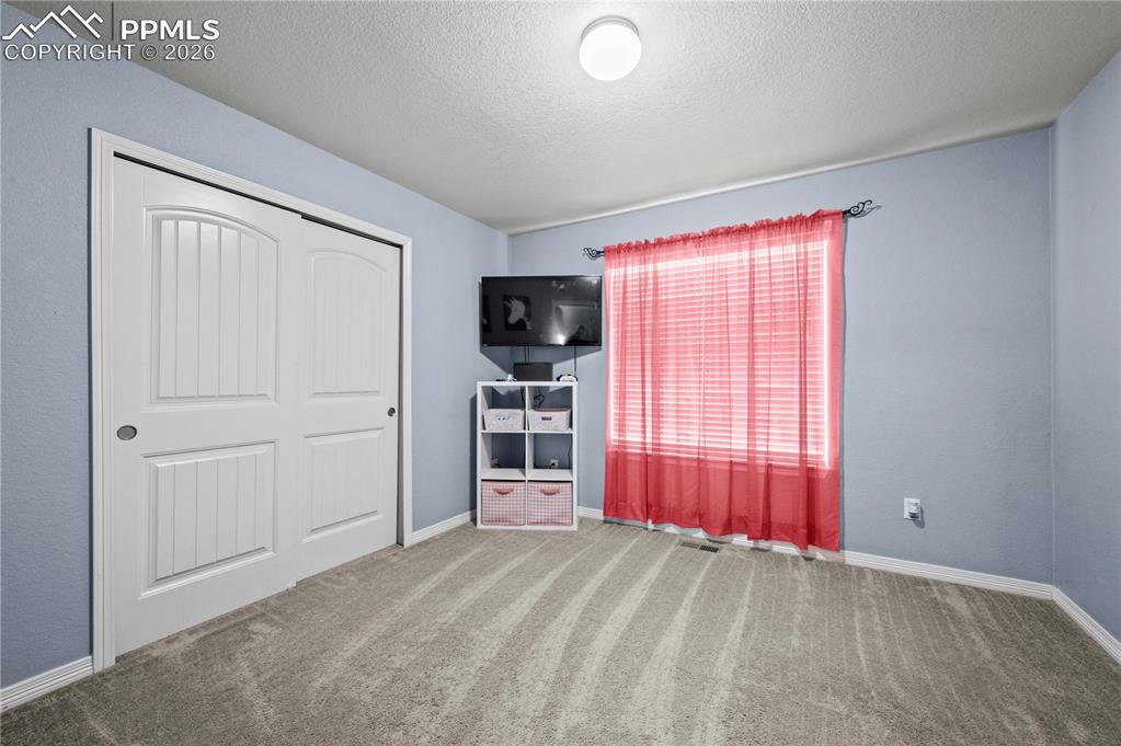 Image 13 of 24: Bedroom