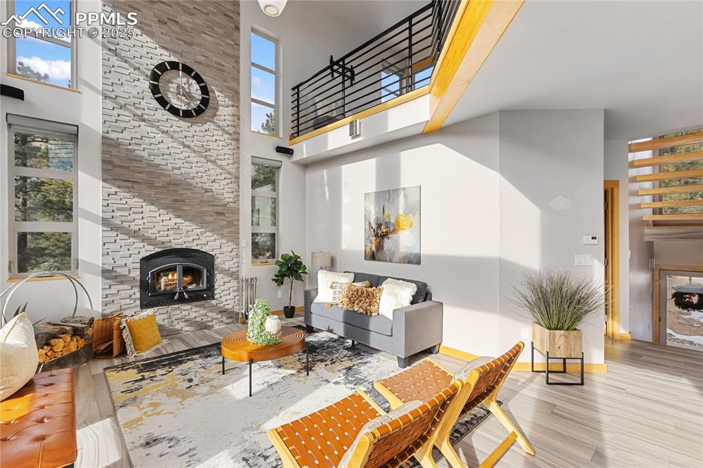 Image 12 of 43: Wood burning fireplace to enhance the ambiance