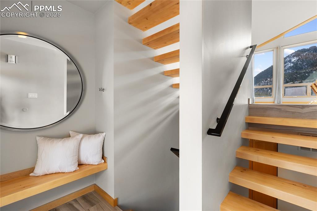 Image 21 of 43: Upper and lower, recently refinished, gorgeous maple wood steps