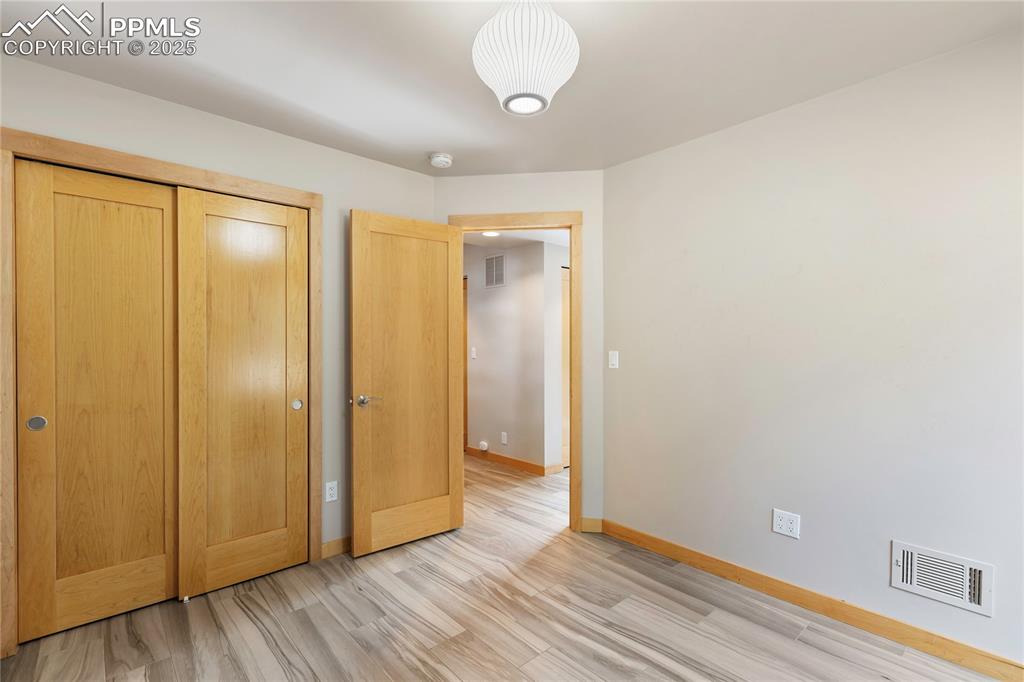 Image 24 of 43: Nice lower level bedroom for guests!