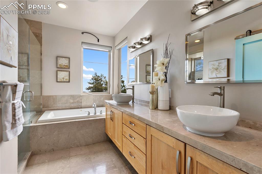 Image 33 of 43: Upper level 5 piece bath.  Pure luxury!