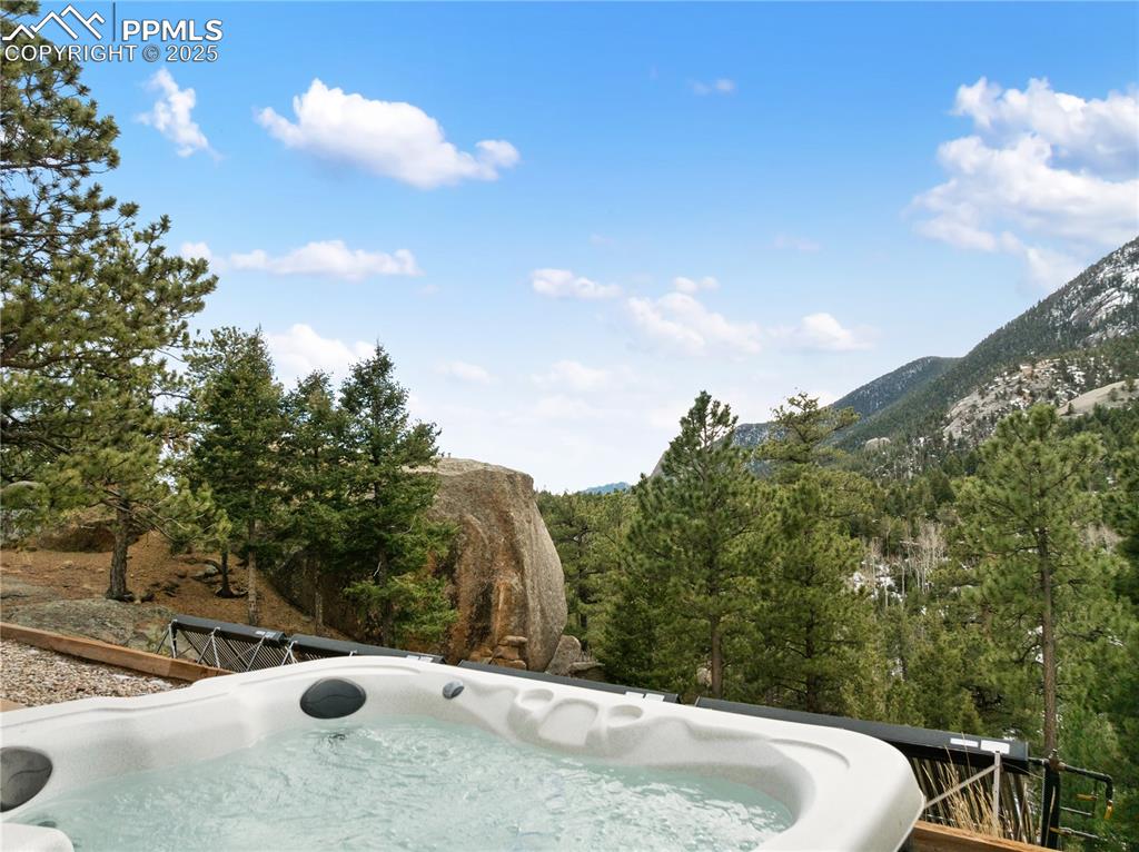 Image 39 of 43: Maybe sit for awhile in the hot tub and enjoy the view!