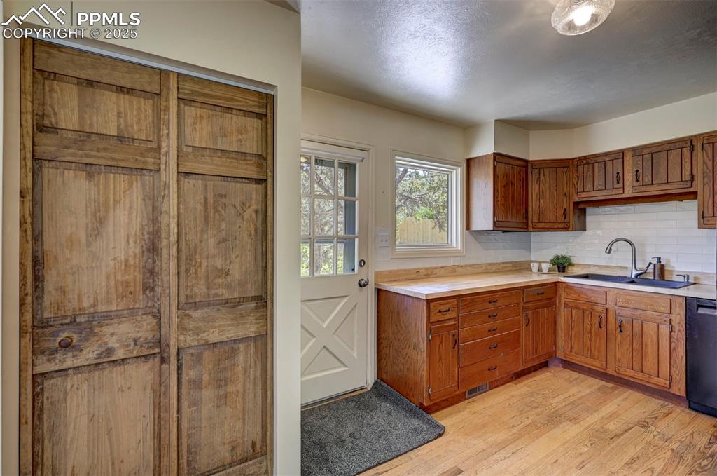 Image 17 of 50: Pantry closet into the Kitchen.