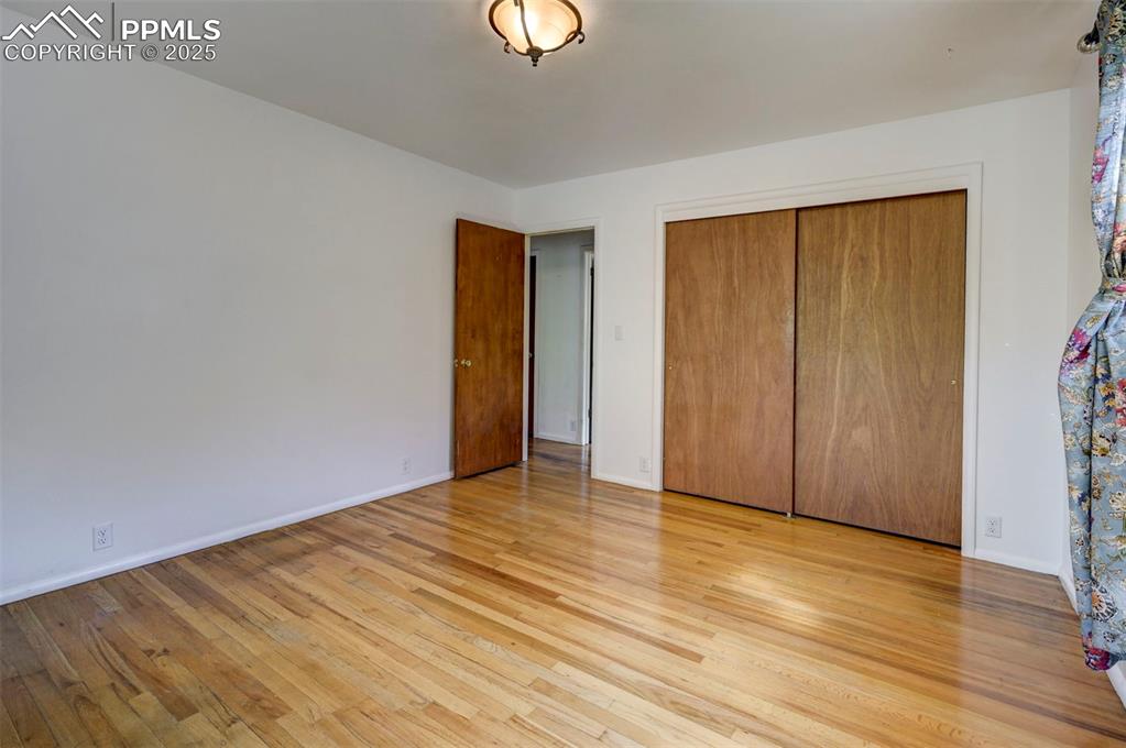 Image 24 of 50: Main Level Primary Bedroom.