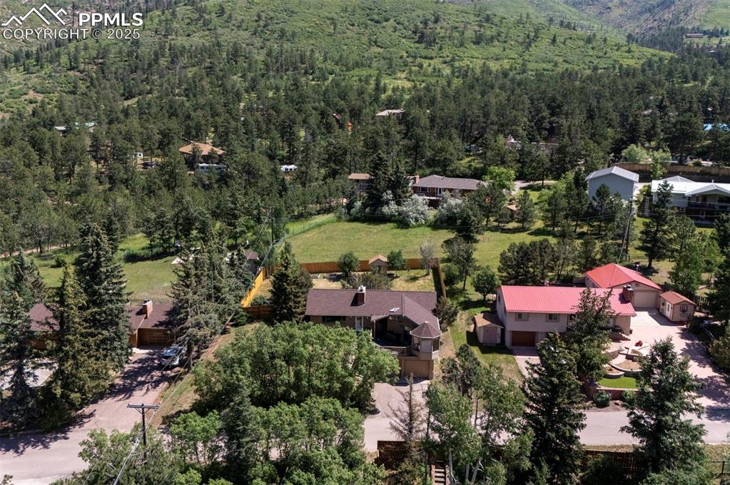 Image 4 of 50: Aerial view of home and neighborhood.