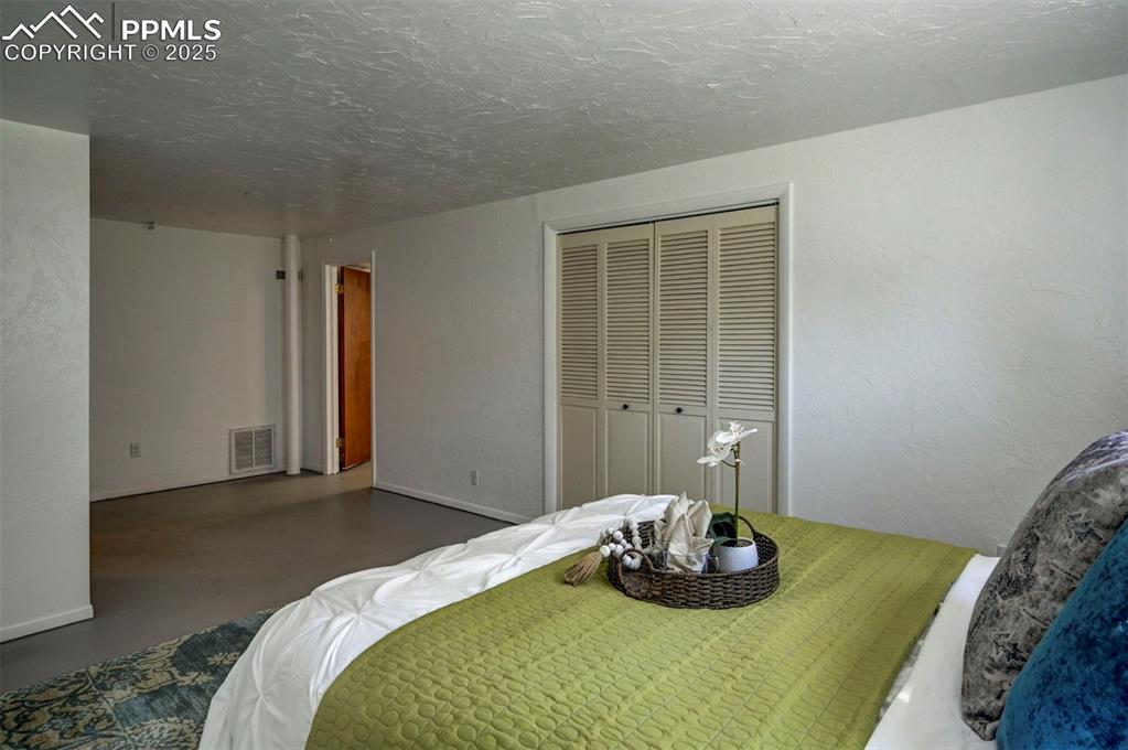 Image 42 of 50: Bedroom #4 has a generous closet.