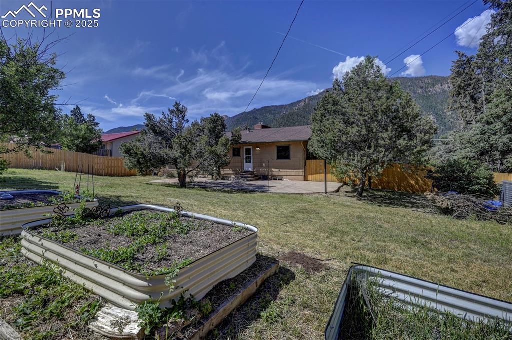 Image 49 of 50: Raised planters for the garden enthusiast to grow their own flowers or food