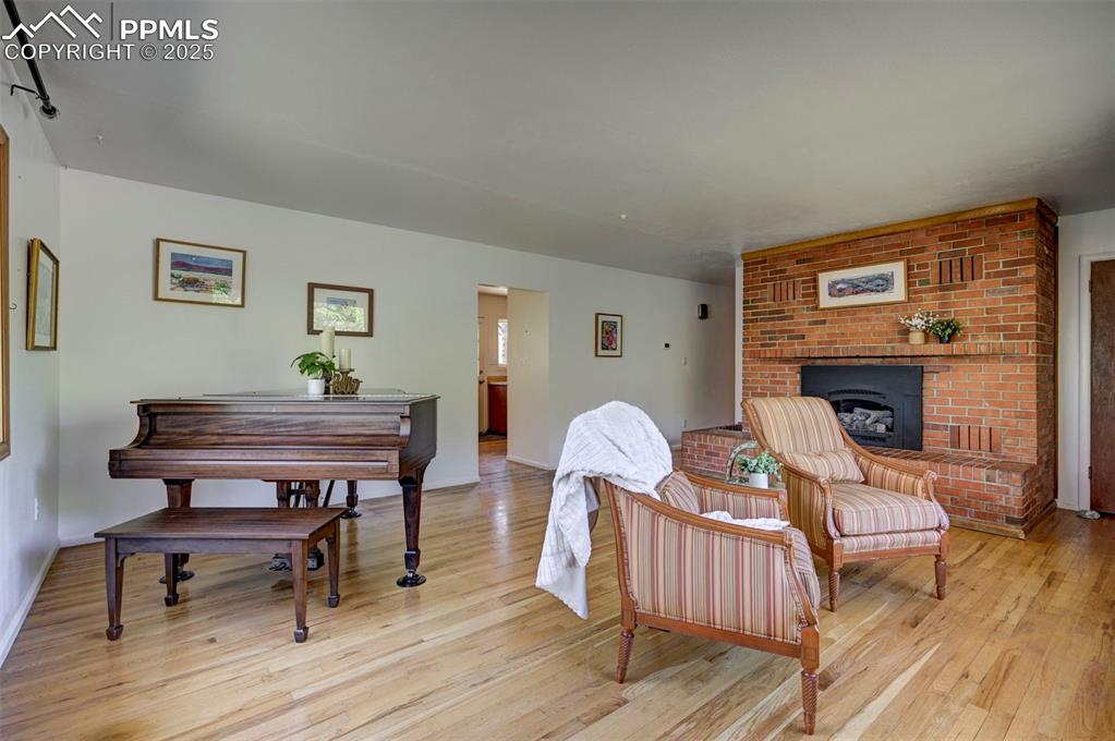 Image 9 of 50: Rich hardwood floors grace most of the main level of this beautiful home.