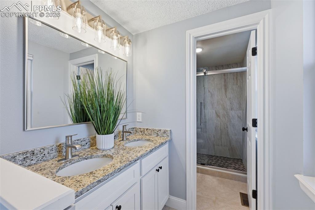 Image 12 of 44: Master Bathroom