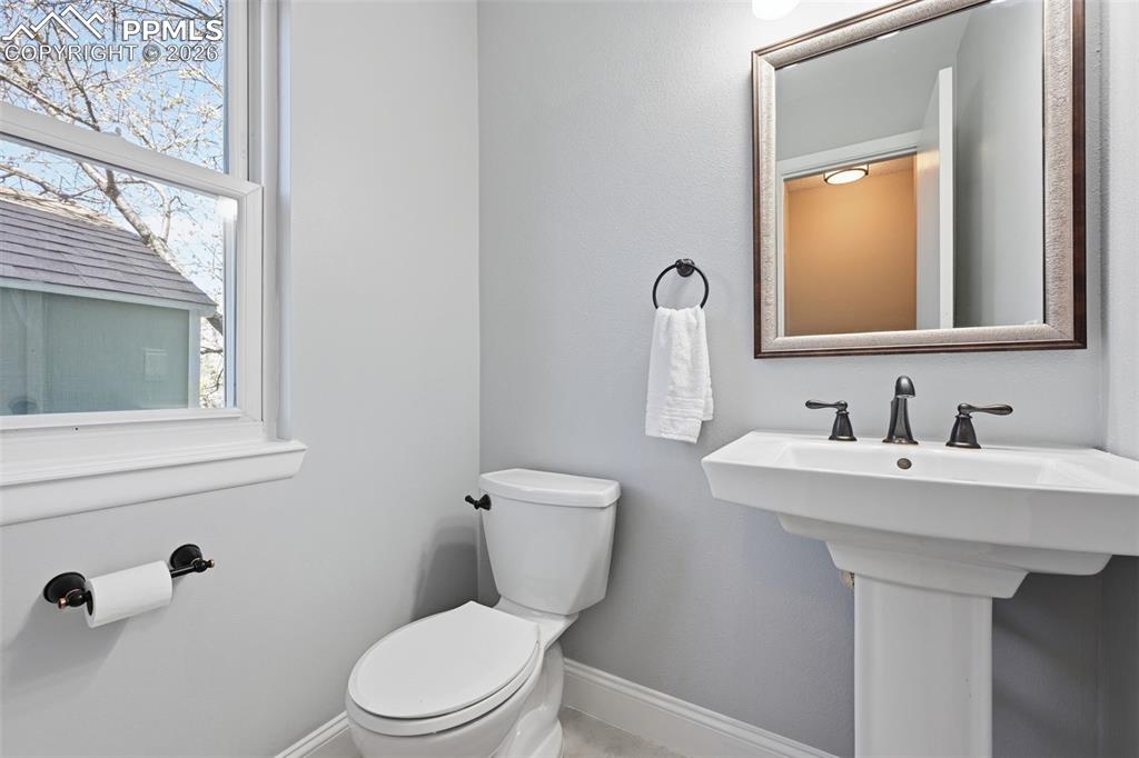 Image 9 of 44: Updated main level half bathroom. 