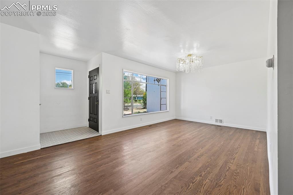 Image 8 of 21: Another picture of the large living area. 