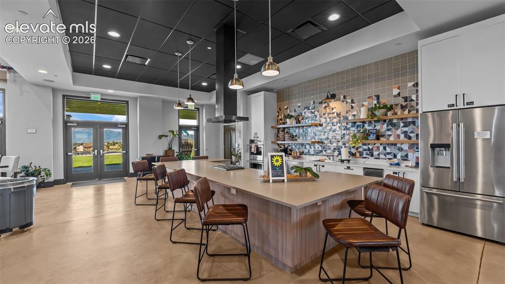 Image 28 of 46: Community kitchen in the clubhouse.
