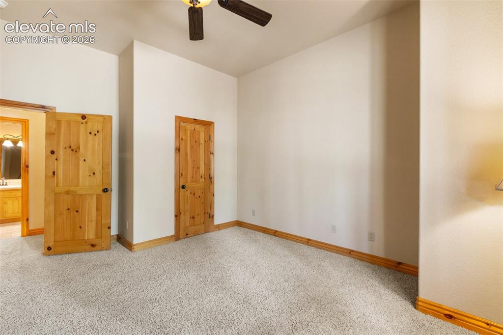 Image 33 of 50: Lower level 4th bedroom with bathroom across the hall, and can be closed of