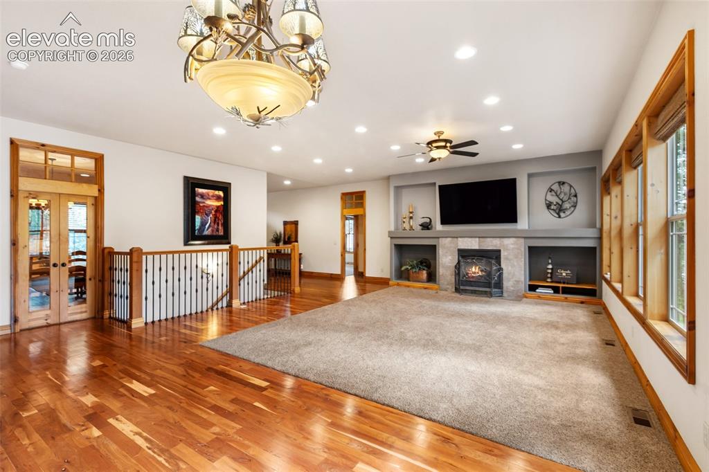 Image 8 of 50: Many interior doors have the special feature of transom windows which adds 