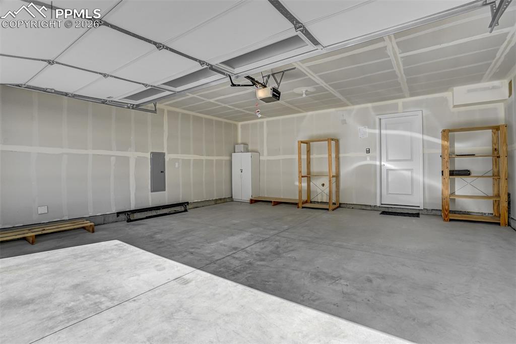 Image 7 of 46: Garage with electric panel
