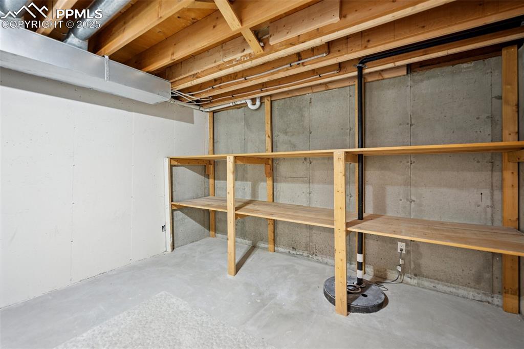 Image 38 of 48: Large storage room in basement