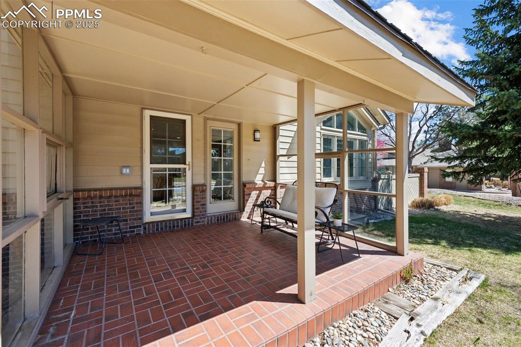 Image 40 of 48: View of patio featuring covered porch