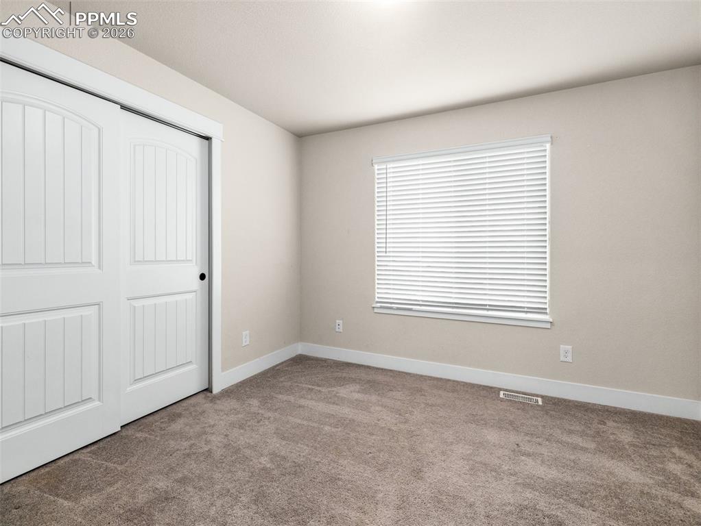 Image 18 of 37: Bedroom