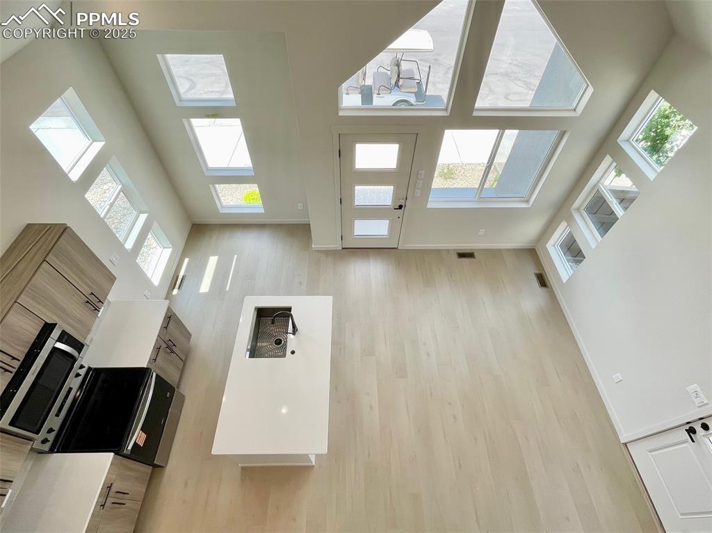 Image 22 of 22: View of main level from the loft