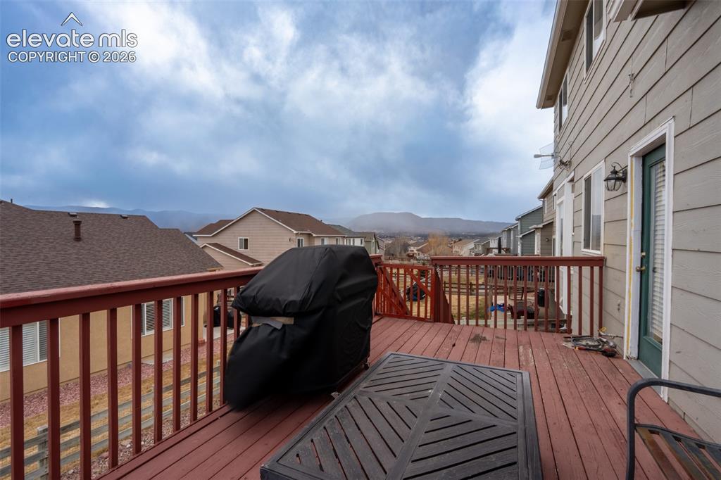 Image 11 of 46: Deck off kitchen walk out - main floor