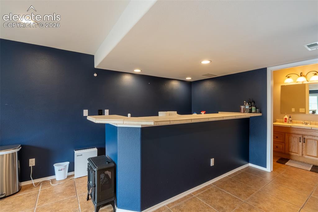 Image 29 of 46: Wet bar - basement