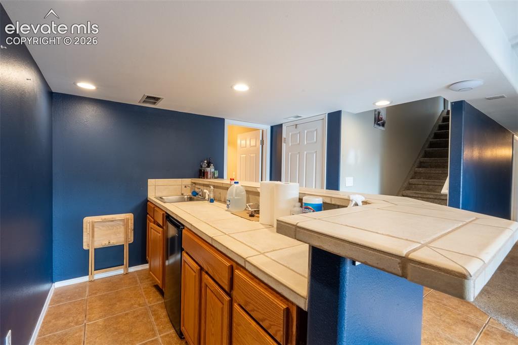 Image 30 of 46: Wet bar - basement