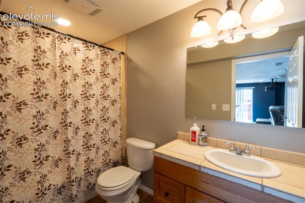 Image 31 of 46: Full bath (4) - basement