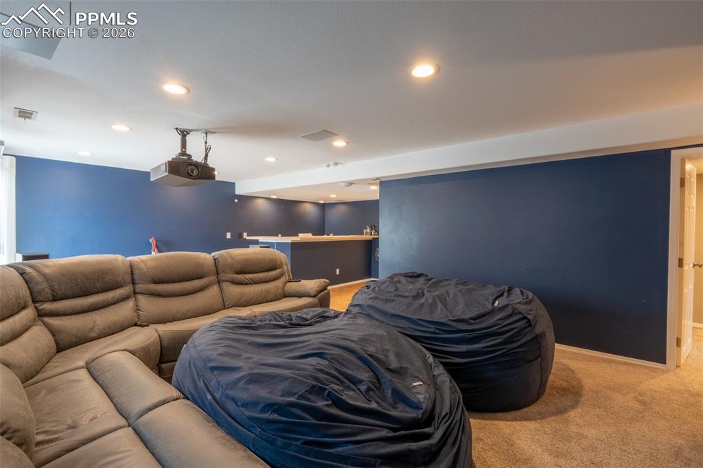 Image 33 of 45: Living room/home theater - basement