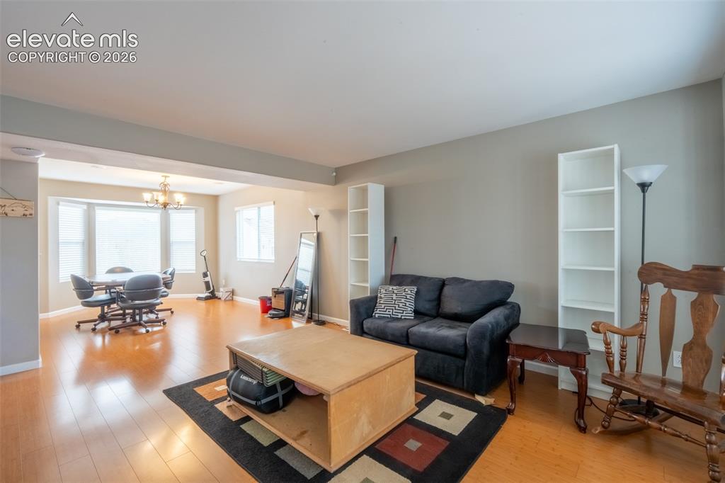 Image 4 of 46: Formal living room/dining room - main floor