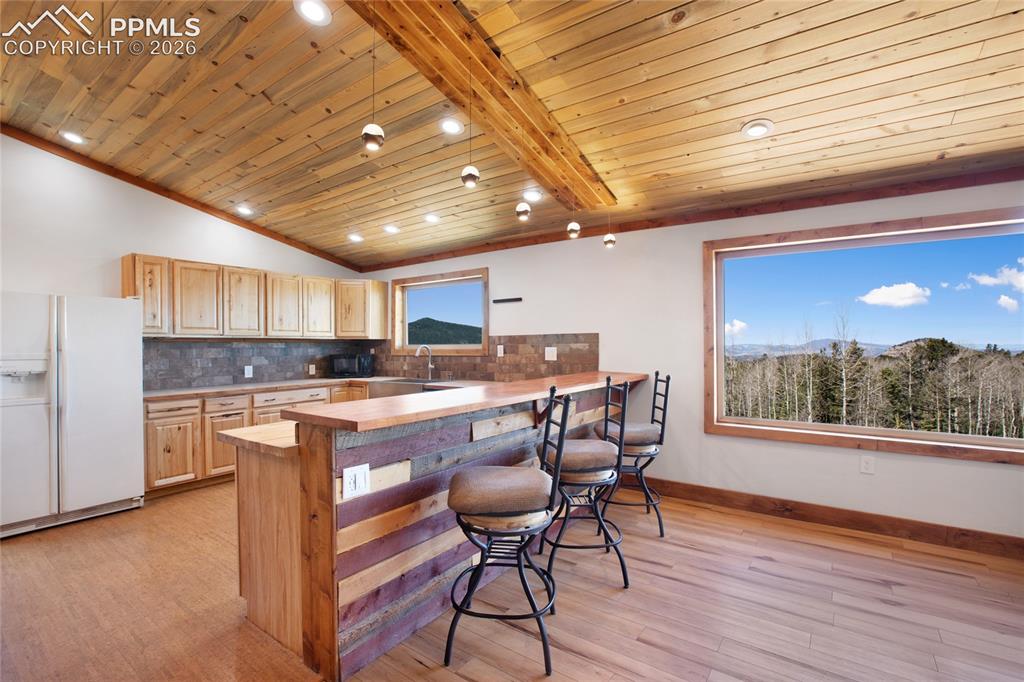 Image 10 of 41: Upper level kitchen