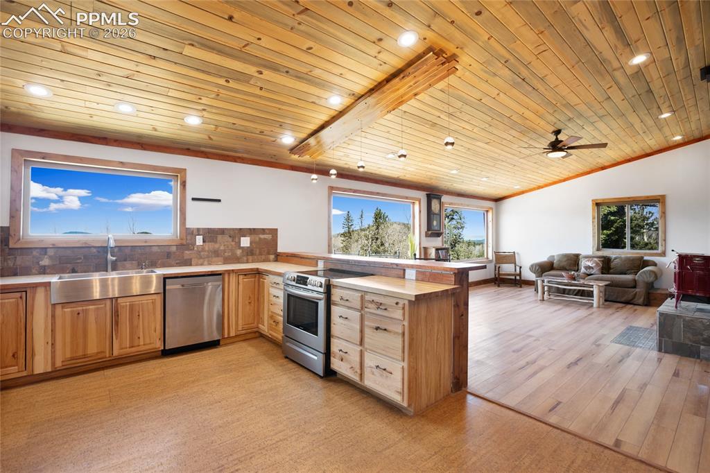 Image 11 of 41: Upper level kitchen