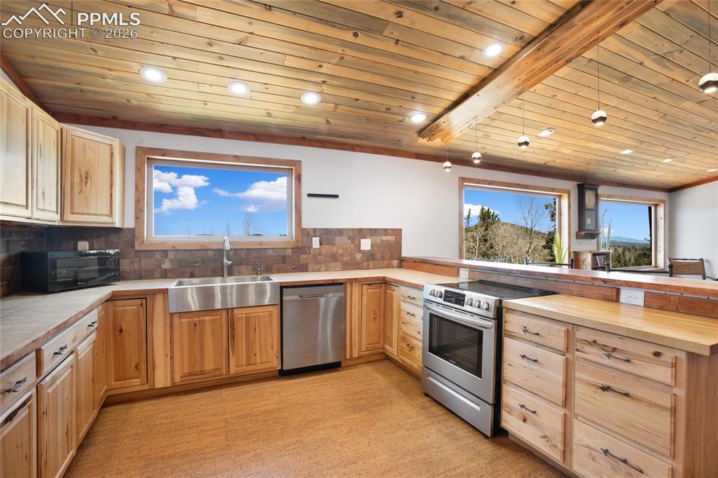 Image 12 of 41: Upper level kitchen