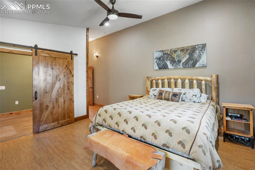 Image 14 of 41: Upper level primary with ensuite