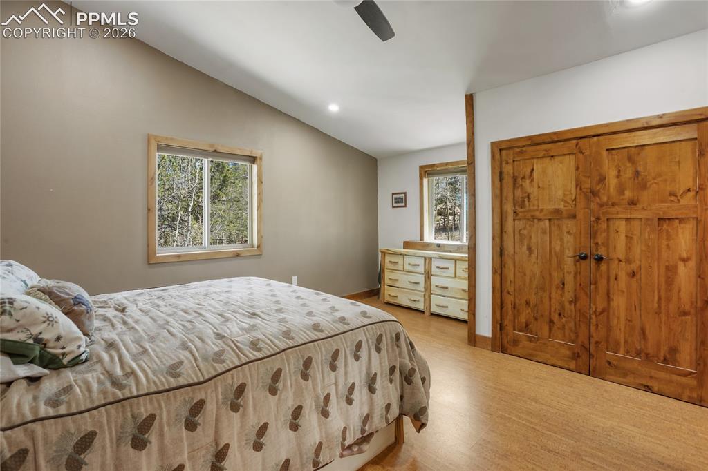 Image 15 of 41: Upper level primary with ensuite