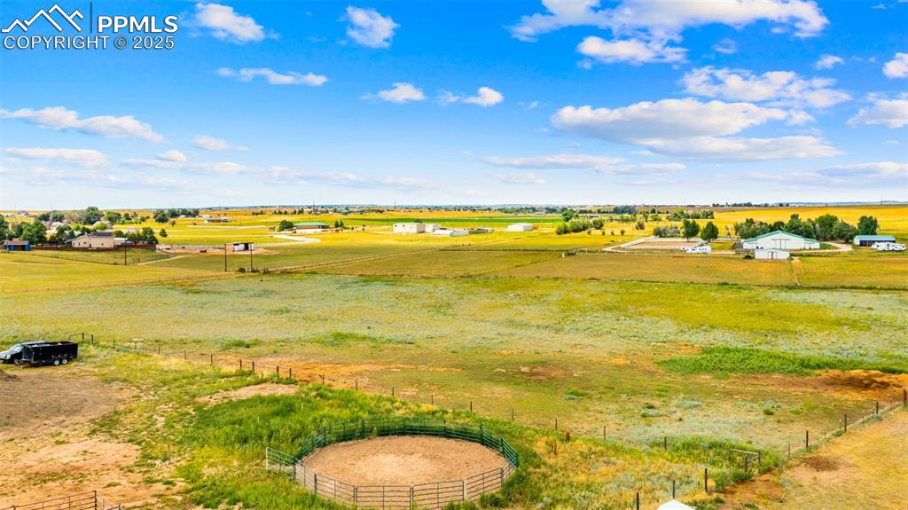 Image 41 of 50: Overview of rural landscape featuring a pastoral area