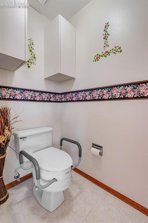 Image 15 of 41: Water closet off the primary bathroom. 