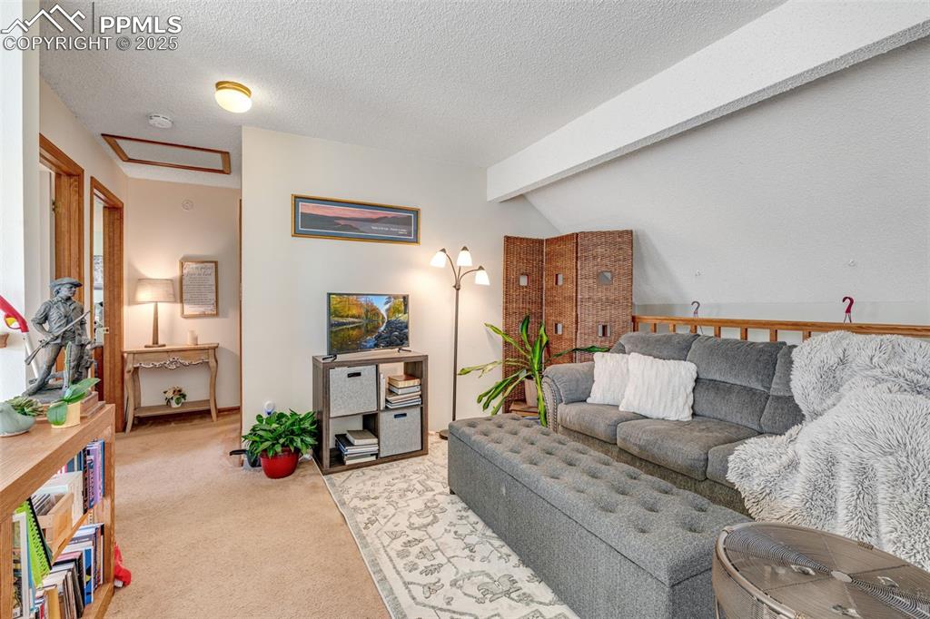 Image 18 of 41: Spacious loft with ample natural light. 