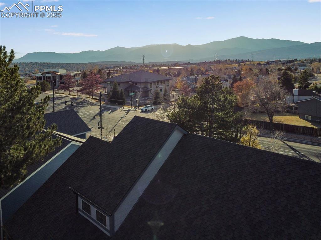 Image 35 of 41: View of mountain backdrop featuring nearby suburban area