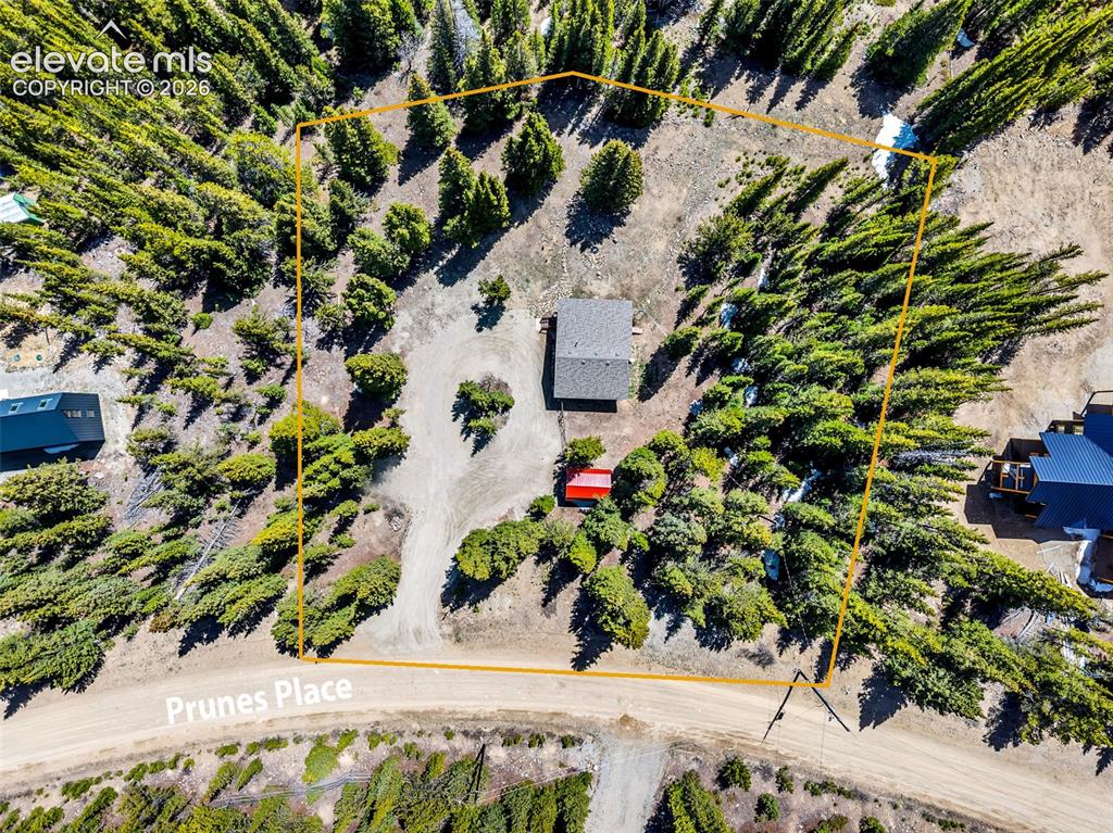 Image 32 of 37: Overhead view of a property featuring a central structure with a gray shing