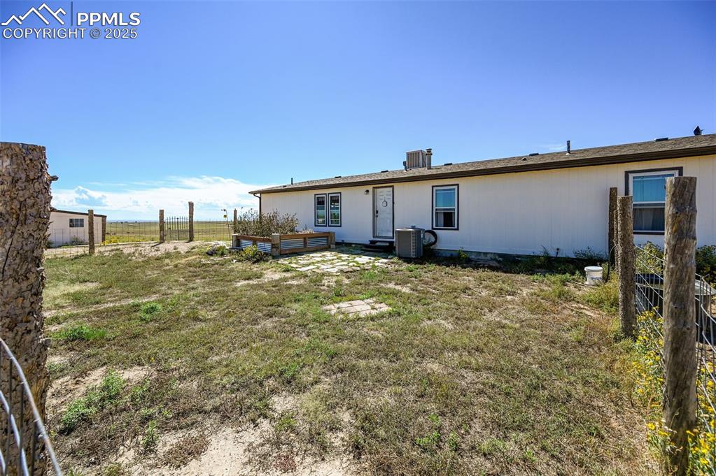 Image 16 of 48: Rear view of property