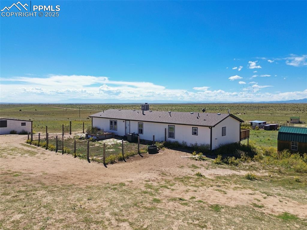 Image 2 of 48: Rear view of property featuring a view of rural / pastoral area