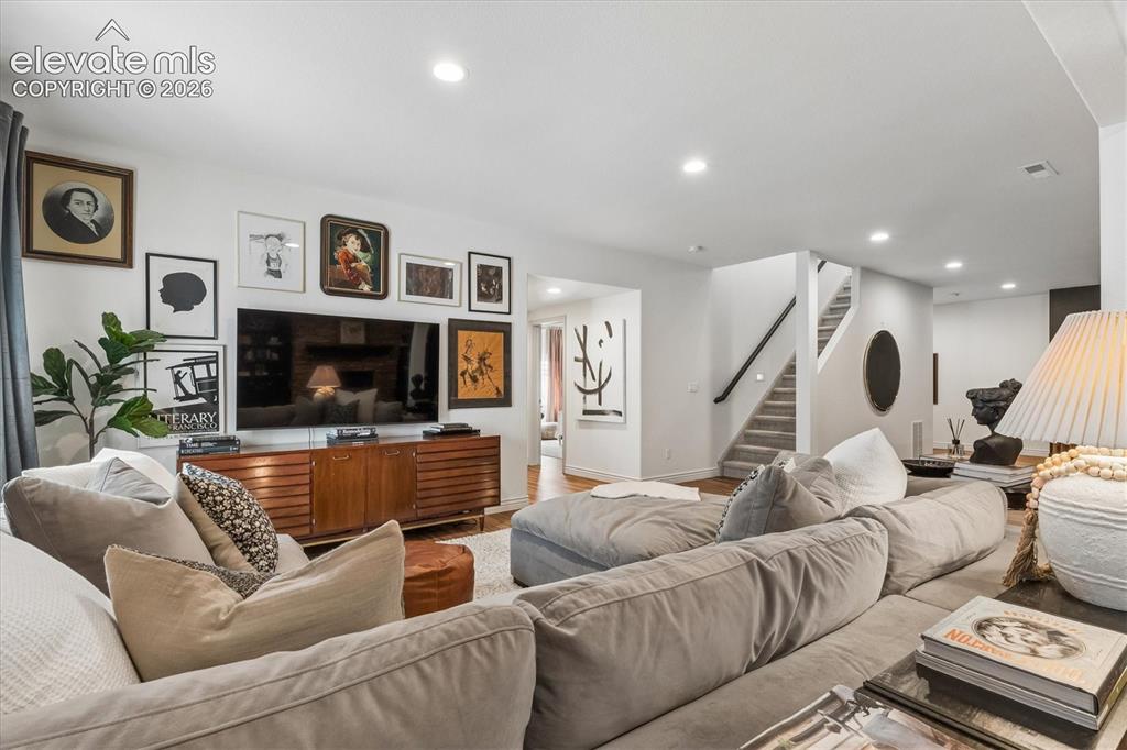 Image 30 of 50: Spacious living area in the finished basement